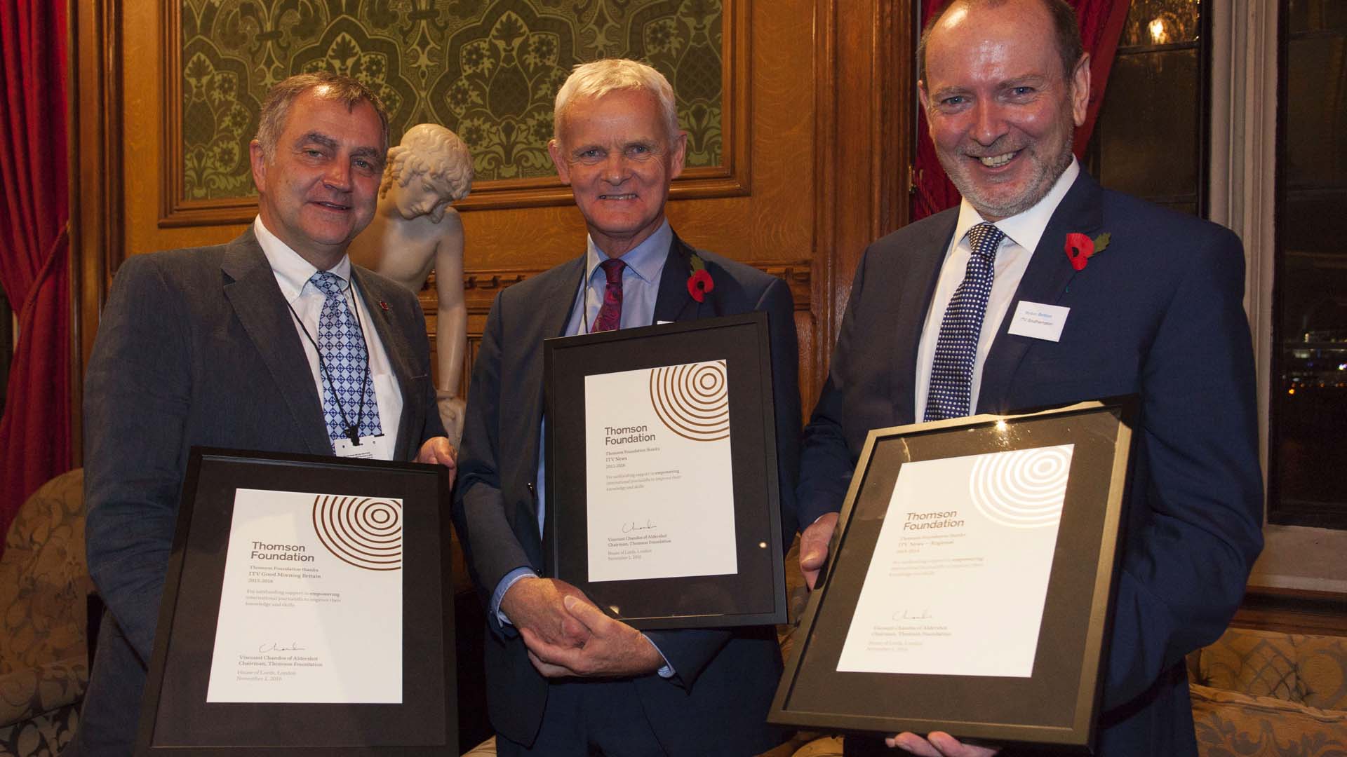 Lord Chandos awarded nine framed commemorative certificates to UK media organisations who had regularly helped empower international journalists Pictured: Robin Elias, Robin Britton and Neil Thompson from ITV